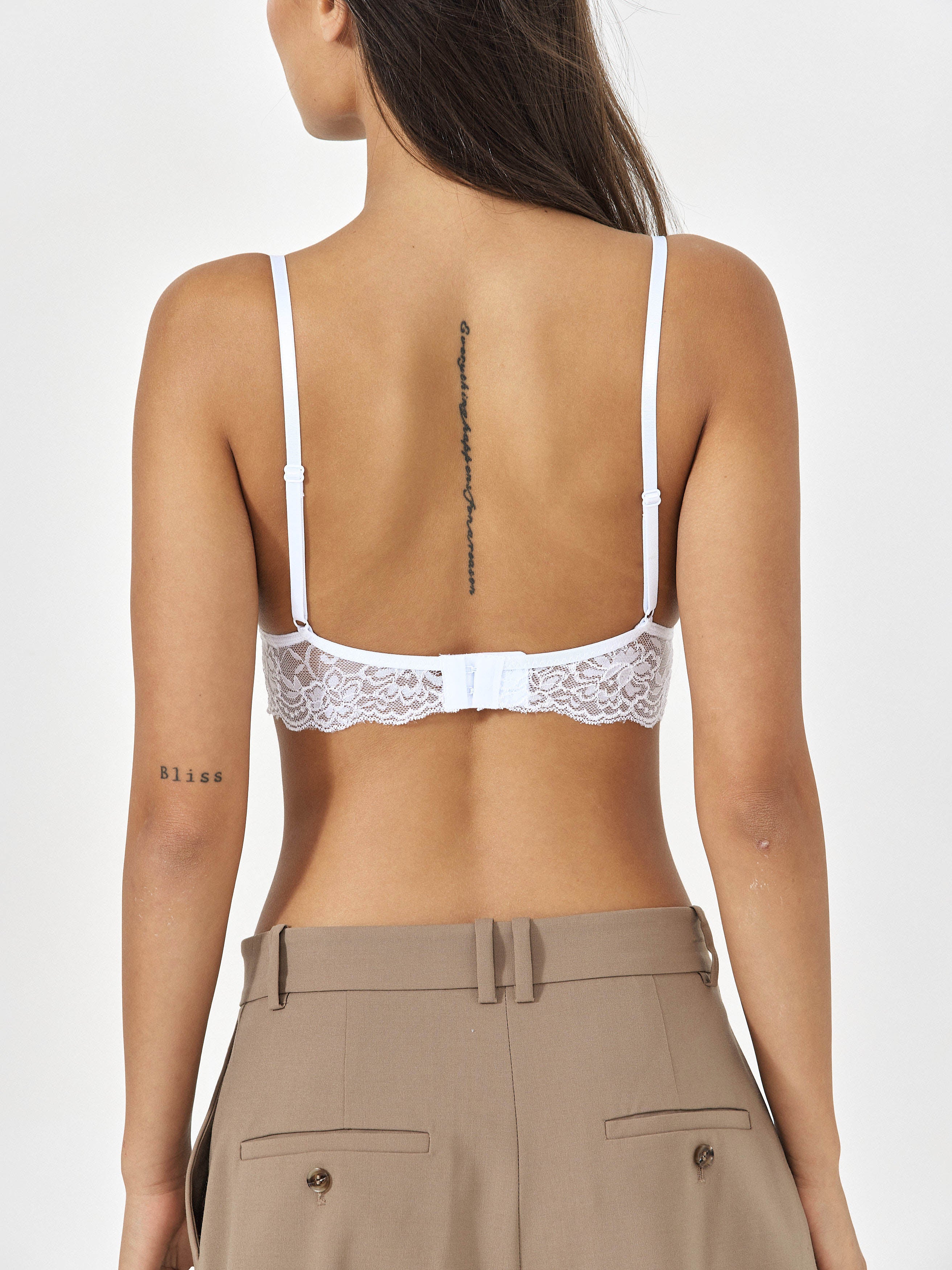 Side View Of White Bralette With Adjustable Straps